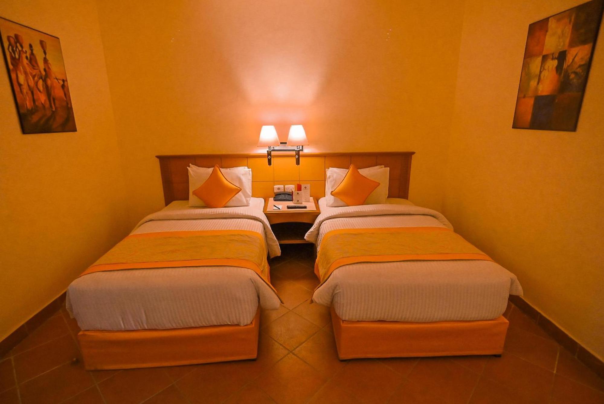 Charmillion Gardens Aquapark 호텔 샤름 엘 셰이크 외부 사진 A room at the hotel
